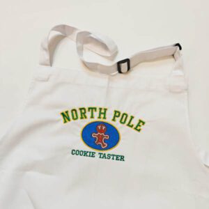 weiße Schürze mit Stickerei North Pole Cookie Tester